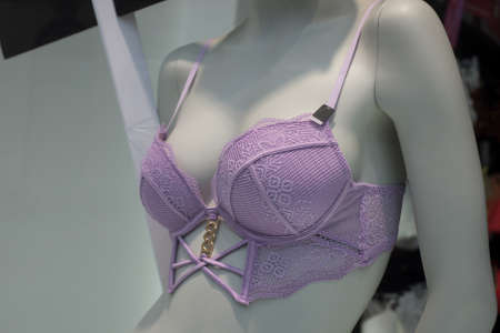 Closeup of purple bra on mannequin in a fashion store showroomの写真素材
