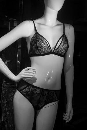 Closeup of black transparent bra on mannequin in fashion store showroomの写真素材