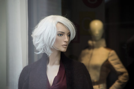 Portrait of mannequin with white hairs  in a fashion store showroomの写真素材