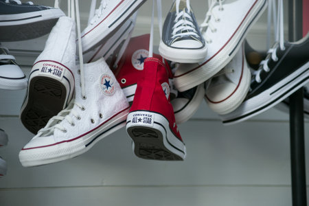 Mulhouse - France - 21 February 2021 - Closeup of vintage sneakers collection by Converse in a fashion store showroomのeditorial素材