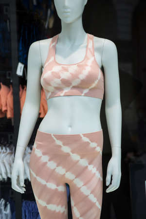 Closeup of fitness clothes on mannequin in a fashion store showroomの写真素材
