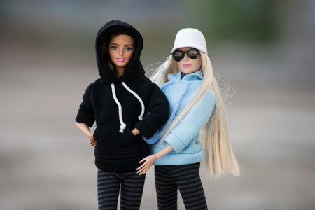 Mulhouse - France - 27 April 2021 - Portrait of two barbie dolls wearing a stripped leggings and...
