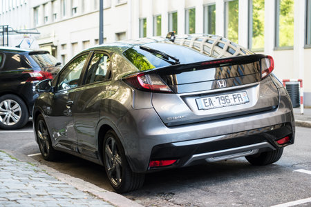 Mulhouse - France - 9 May 2021 - Rear view of new grey Honda Civic parked in the streetのeditorial素材