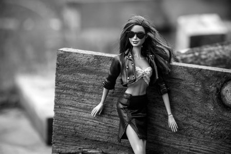 Mulhouse - France - 17 May 2021 - Portrait of brunette barbie doll wearing leather skirt and leather...