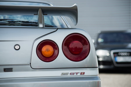 Mulhouse - France - 8 August 2021 - Closeup of rear light of grey Nissan skyline GT parked in the streetのeditorial素材