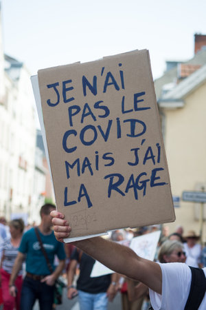 Mulhouse - France - 24 July 2021 -  closeup of banner  with text on shirt in french, je n'ai pas le covid, j'ai la rage, in english, I don't have the covid, I have rabiesのeditorial素材