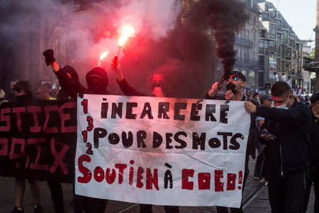 Strasbourg - France - 2 October 2021 - People protesting with banner in french : incarcÃ©rÃ© por des mots, soutien Ã  coco , in english : jailed for words, coco supportのeditorial素材