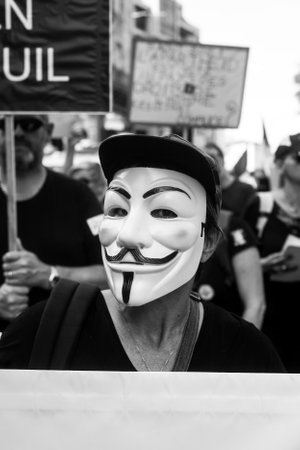 Strasbourg - France - 2 October 2021 - Portrait of people protesting in the street against the sanitary pass with the anonymous mask on headのeditorial素材
