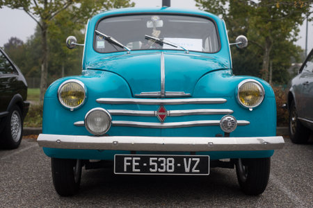Mulhouse - France - 10 October 2021 - Front view of blue Renault 4CV parked in the streetのeditorial素材