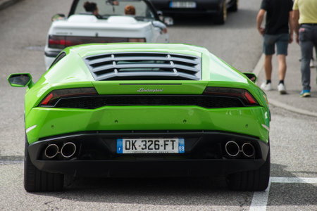 Mulhouse - France - 8 August 2021 - Rear view of green Lamborghini huracan parked in the streetのeditorial素材