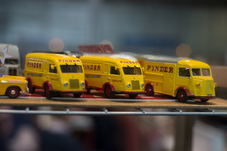 Mulhouse - France - 24 October 2021 - Closeup of yellow miniature cars collection from pinder circus at the fela marketのeditorial素材