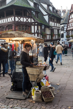 Strasbourg - France - 6 November 2021 - view of roasted chestnuts selling in the streetのeditorial素材