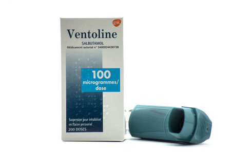 Mulhouse - France - 25 November 2021 - Closeup of Ventoline asthma aerosol inhaler on white...