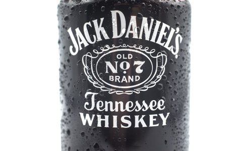 Mulhouse - France - 6 December 2021 - Closeup of drops of water on Jack Daniel's cola whisky cocktail in can on white backgroundのeditorial素材