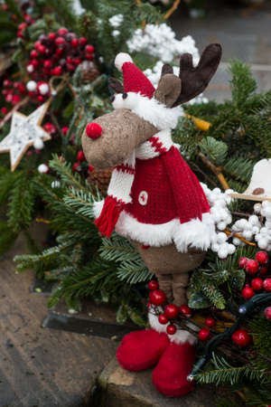 Closeup of decorative christmas reindeer standing in the streetの写真素材