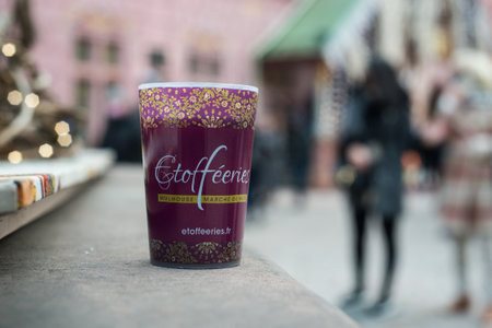 Mulhouse - France - 13 December 2021 -  Closeup of mulled wine in a traditional cup at the christmas...