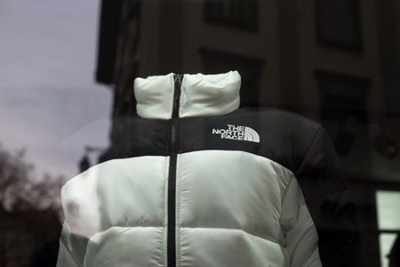 Colmar - France - 2 January 2022 - Closeup of the north face winter coat in a fashion store showroomのeditorial素材