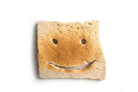 Closeup of expressive toasted slices of bread on white backgroundndの写真素材