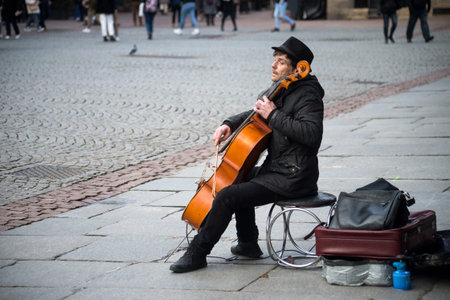 Strasbourg - France - 8 January 2022 - Portrait of cellist playing in the street