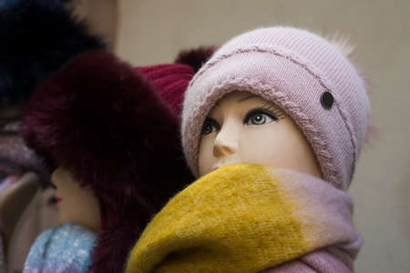 Closeup of woolen hats on mannequin  at the market in the streetの写真素材