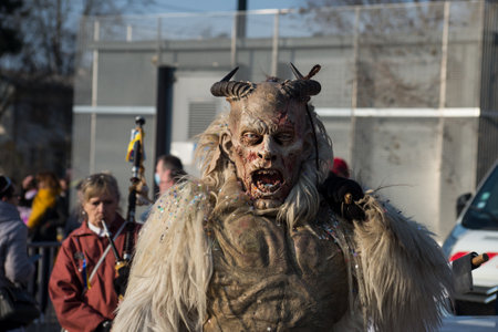 Mulhouse - France - 6 March 2022 - Portrait of people with scary costume parading in the street