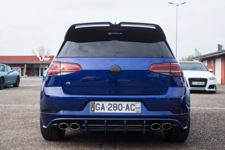 Lutterbach - France - 3 April 2022 - Rear view of blue Vollkswagen golf 7 type R parked in the streetのeditorial素材