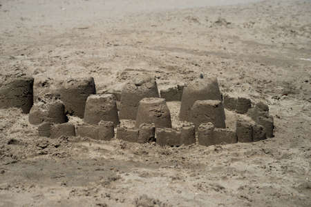 Closeup of traditional sand castle on the beach