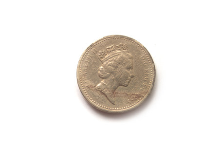 Closeup of the queen Elisabeth II  on british coin on white background