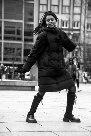 Strasbourg - France - 21 January 2023 - Portrait of african girls dancing in the streetのeditorial素材