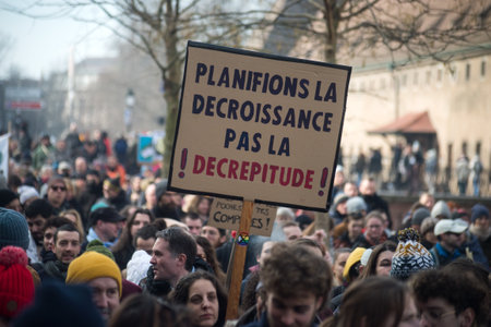 Strasbourg - France - 11 February 2023 -  people protesting with placard in french : planifions la...