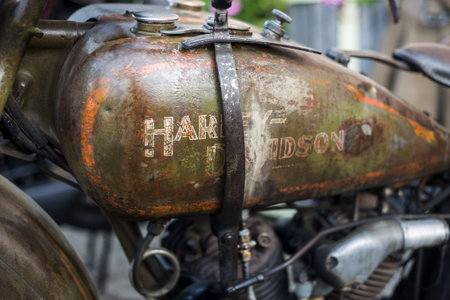 Pfaffenheim- France -  - 1 October 2023 - Closeup of rusty tank of Harley Davidson motorbike in outdoorのeditorial素材