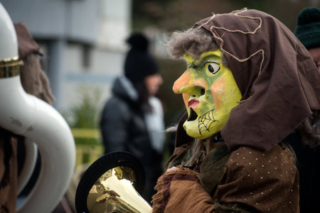 Ridiesheim - France - 2 February 2024 - Portrait of masked people parading in the streetのeditorial素材