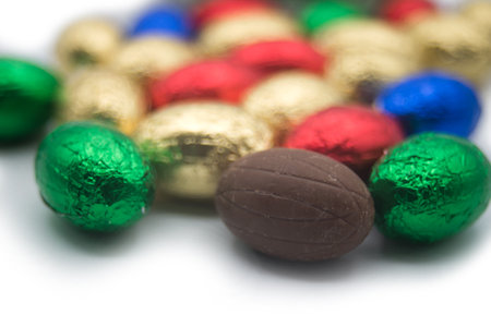 closeup of chocolate easter eggs on white backgroundの写真素材