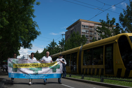 Mulhouse - France - 30 May 2024 - portrait of pharmacists protesting in the street against the shortage of medicinesのeditorial素材