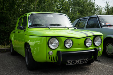 Mulhouse - France - 9 June 2024 - front view go green renault 8 gordini parked in the streetのeditorial素材