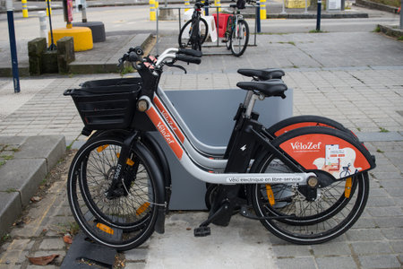 Brest - France - 9 July 2024 - Profile view of electric bicycle parked in the street