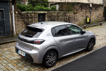 Quimper - France - 9 July 2024 - rear view of grey peugeot 208 style parked in the streetのeditorial素材