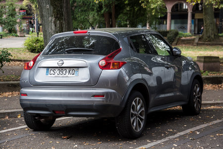 Mulhouse - France - 4 september 2024 - rear view of grey Nissan Juke parked in the streetのeditorial素材