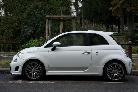 Mulhouse - France - 8 September 2024 - Profile view of white Fiat Abarth parked in the streetのeditorial素材