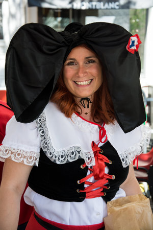 Mulhouse - France - 8 September 2024 - Portrait of woman wearing an alsatian costume smiling in the streetのeditorial素材