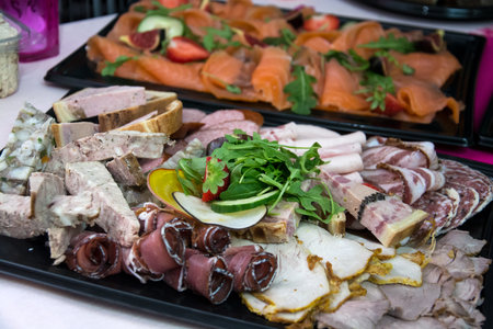 Closeup of pork and salmon assortiment at the party buffetの写真素材