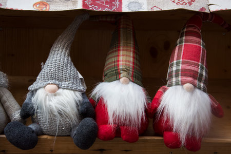 Closeup of christmas gnomes in a decoration store showroomの写真素材