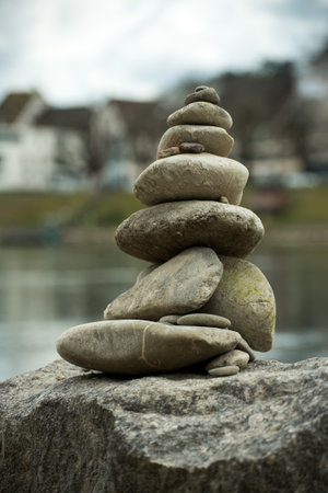 Closeup of stone balance in border riverの写真素材