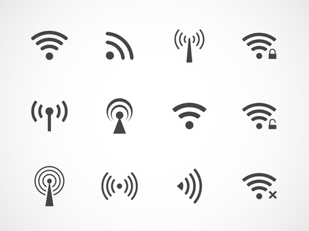 Set of twelve different black vector wireless and wifi icons for remote access and communication via radio wavesのイラスト素材