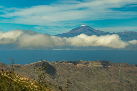 Rocks of Island of La Gomera. View of Tenerife with huge volcano Teide. Canary Islands, Spainの写真素材