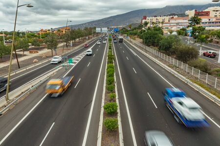 City traffic. The route for the movement of cars, highway, visew from a height. Cars Drive at high speed.. Copy space for text.の写真素材