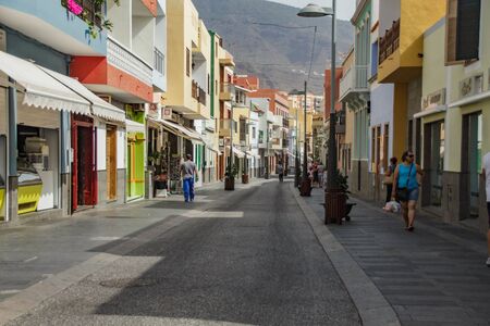 CANDELARIA, SPAIN - JULY 22: Some tourist and local people are walking in a commercial street in Candelaria, Tenerife, Spain. Candelaria is a famous touristic destination in Tenerife, Spain.のeditorial素材