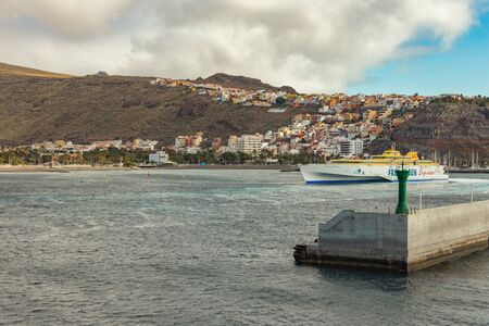 Port and town San Sebastian - capital of La Gomera Island. View from the ferry cruising between the islands of Tenerife and La Gomera. Canary Islands, Spain.のeditorial素材