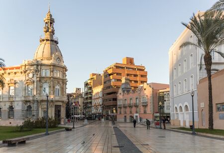 CARTAGENA, SPAIN - December 2, 2017: Beautiful sunset near City Hall of Cartagena, spanish city and a major naval station in the Region of Murcia, by the Mediterranean coast, south-eastern Spain.のeditorial素材