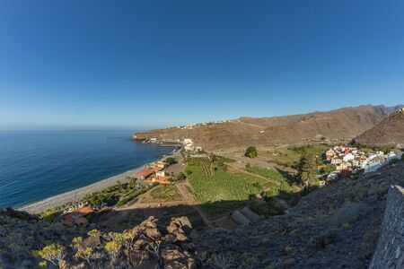 Early morning of quiet warm, sunny weather in the beach and harbor. Aerial view of Playa de...